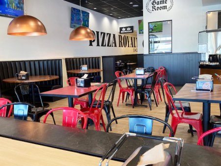 The new Round Table Pizza Restaurant is a delightful, well-lit restaurant in the Save Mart Shopping Center.
